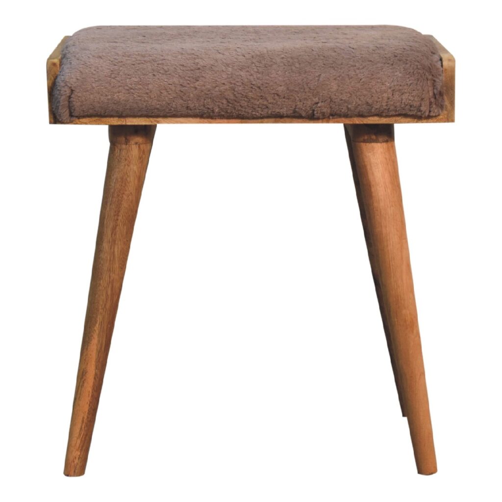 Wooden stool with brown upholstered top.