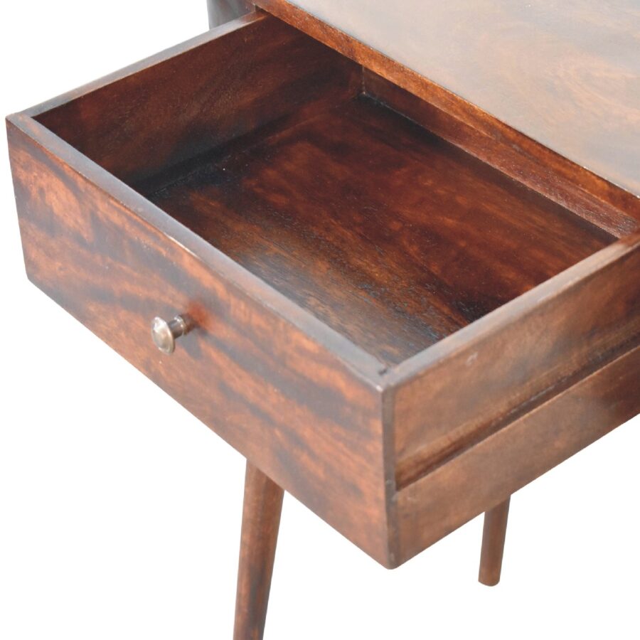 Open wooden drawer in side table.