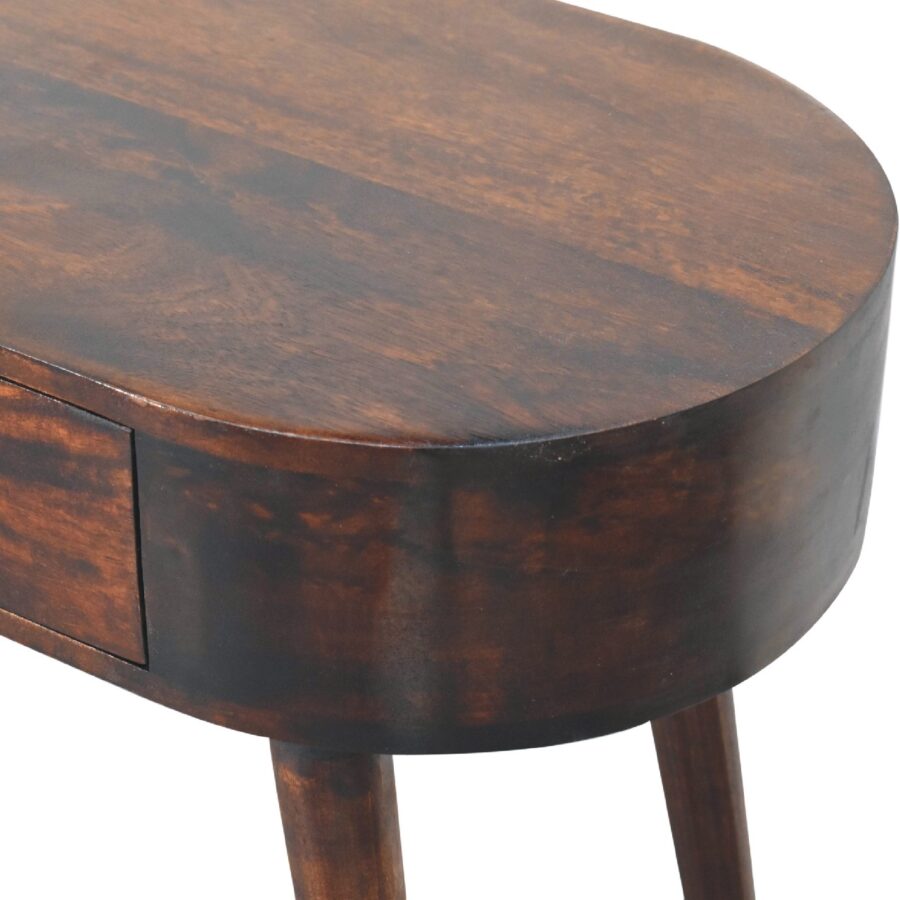 Round wooden side table with drawer.