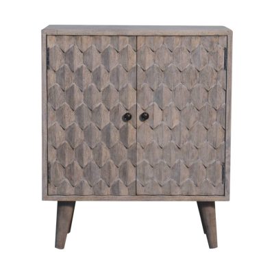 Wooden textured cabinet with geometric pattern doors.