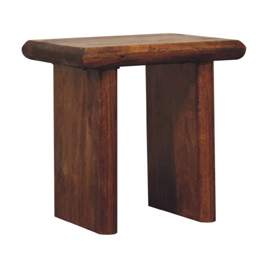 Solid wooden stool on white background.