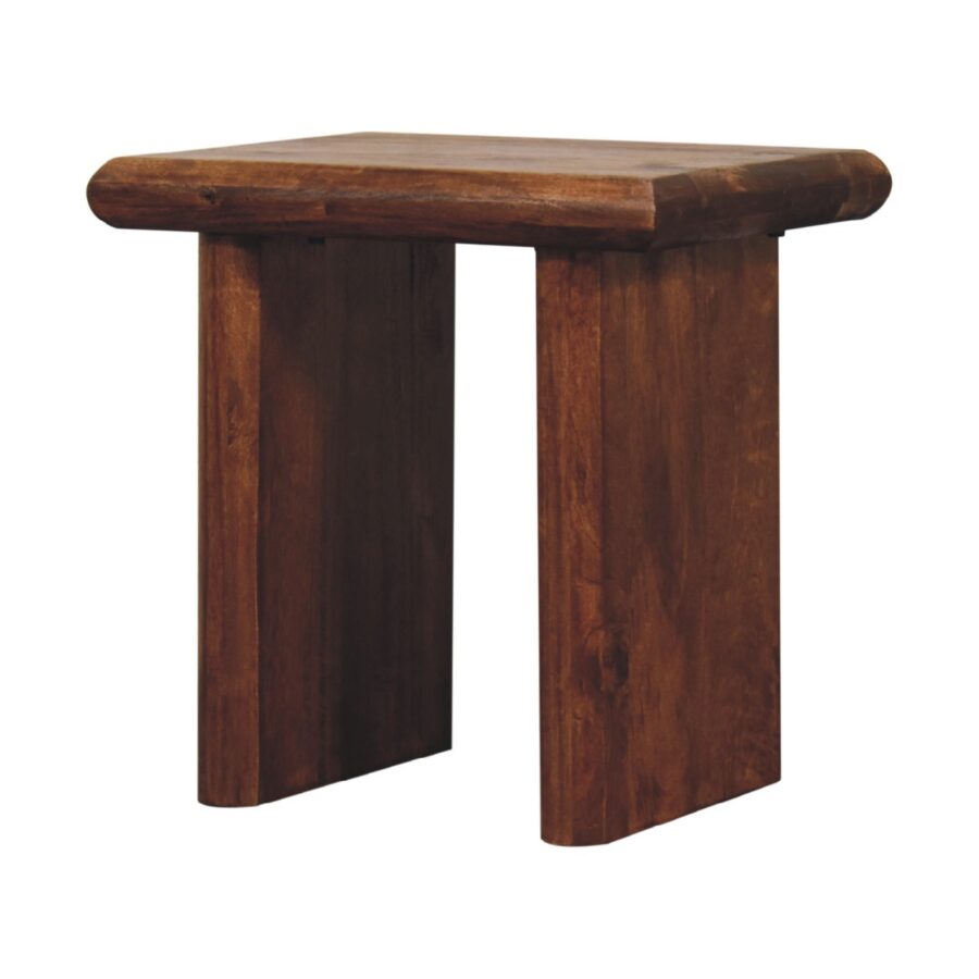 Solid wood rustic stool on white background.