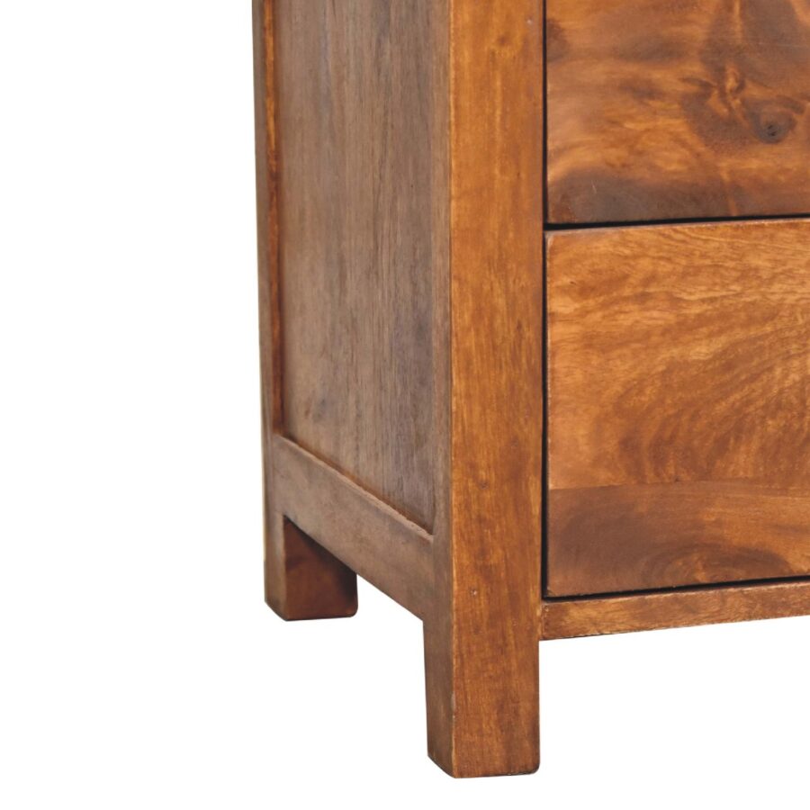 Wooden bedside table with drawer detail.
