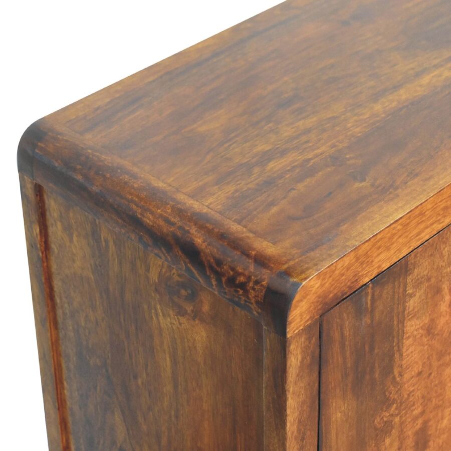 Close-up of wooden table corner.
