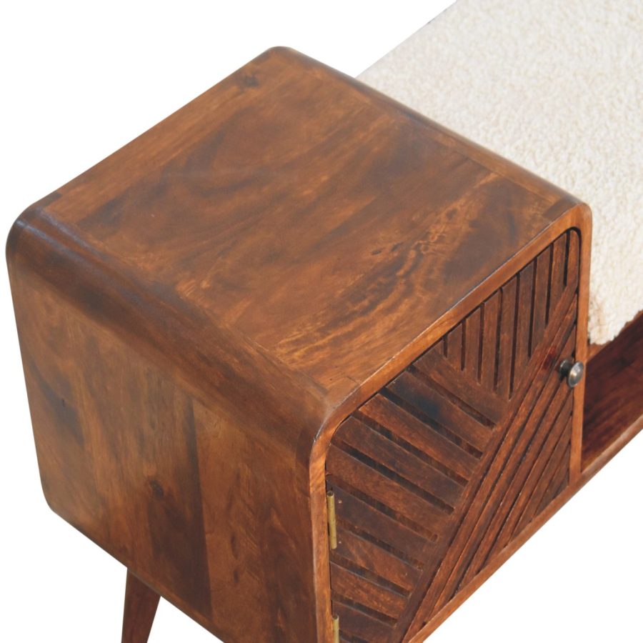 Wooden bedside table with slatted detail.